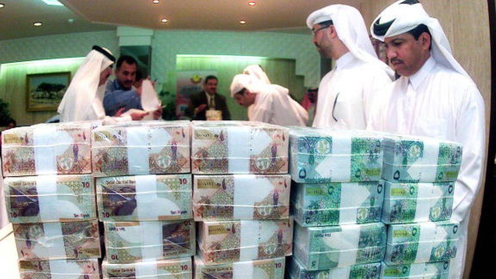 counterfeit currency in qatar